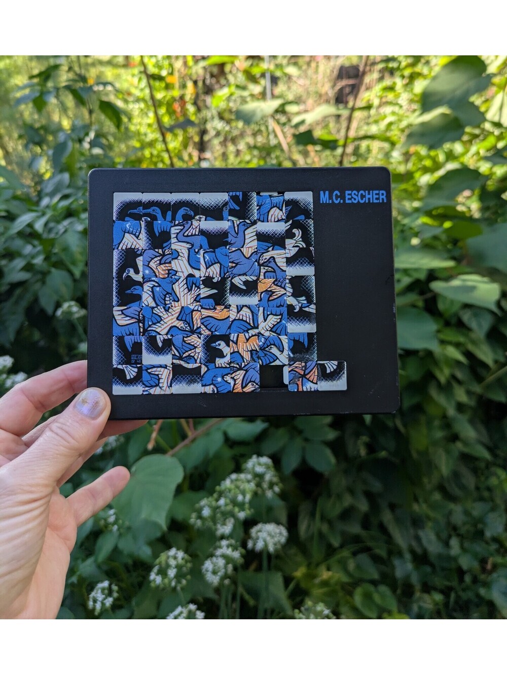 Vintage M. C. Escher "Sun and Moon" slide tile puzzle, Pussycat Branded.